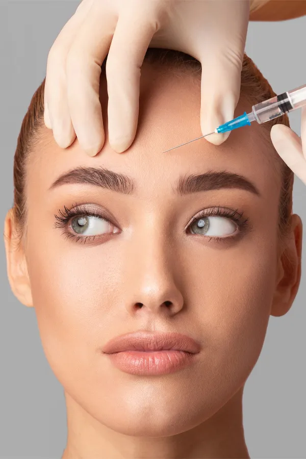 Botox-Treatment Close up of a woman with receiving a Botox injection in her brow from Healthy Aging Medical Centers of New Jersey in Northern New Jersey.