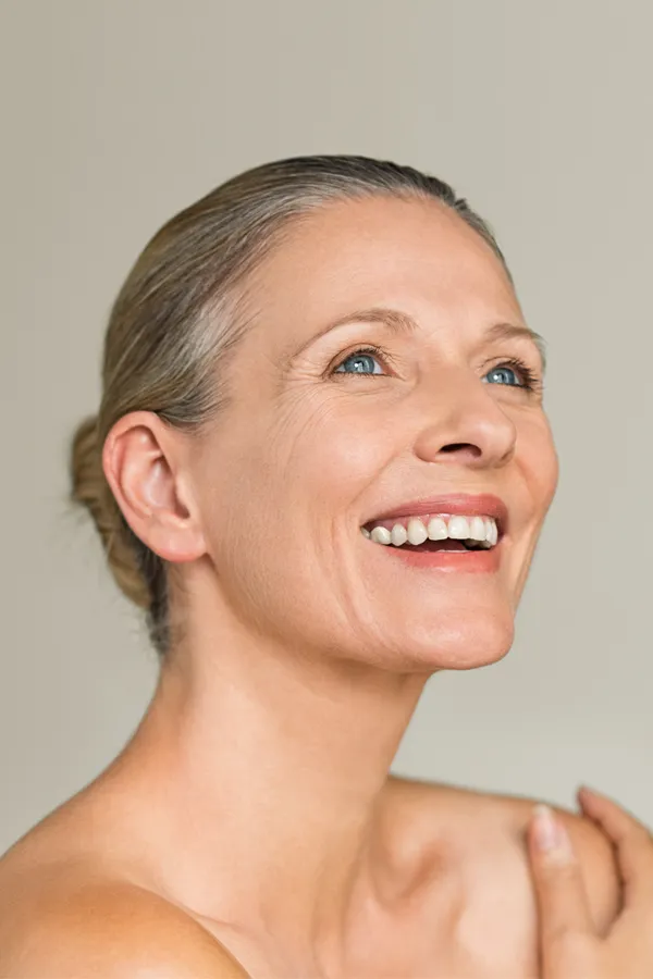 Radiofrequency-Microneedling-for-Neck-Treatment A middle-aged woman with a smooth, trim neck. Get Radiofrequency Microneedling for Neck Skin Treatment from Healthy Aging Medical Centers of New Jersey in Northern New Jersey.